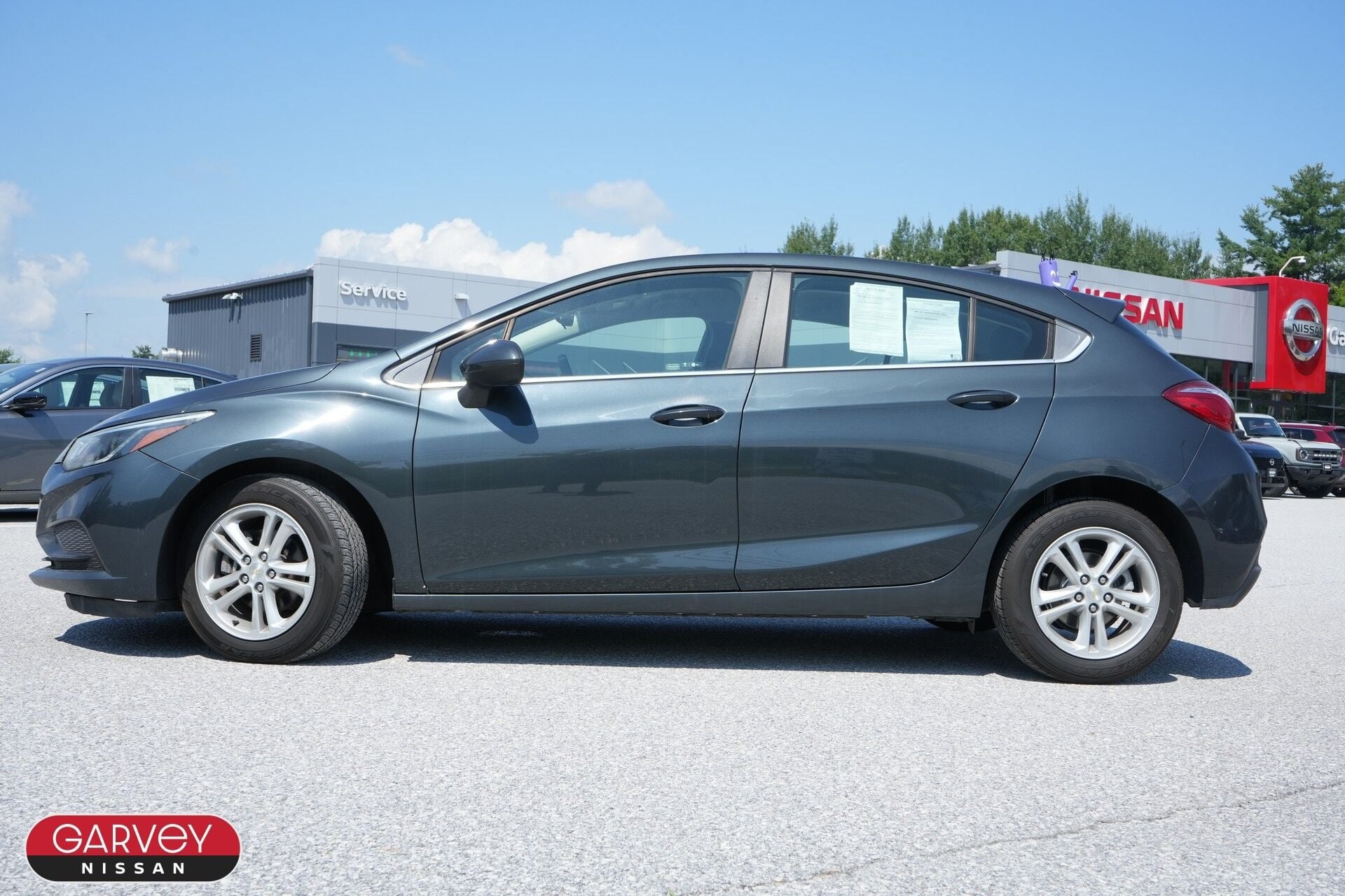Used 2018 Chevrolet Cruze LT with VIN 3G1BE6SM7JS614382 for sale in Clarendon, VT
